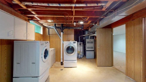 121 Beale Crescent, Fort Mcmurray, AB - Indoor Photo Showing Laundry Room