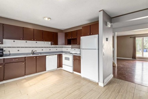 170 Windsor Drive, Fort Mcmurray, AB - Indoor Photo Showing Kitchen With Double Sink