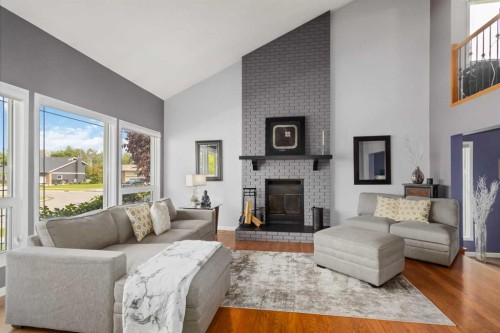 145 Burns Place, Fort Mcmurray, AB - Indoor Photo Showing Living Room With Fireplace