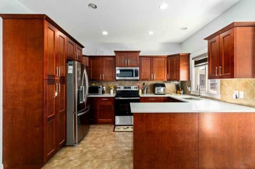 128 Juniper Street, Fort Mcmurray, AB - Indoor Photo Showing Kitchen With Stainless Steel Kitchen