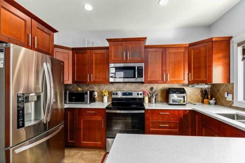 128 Juniper Street, Fort Mcmurray, AB - Indoor Photo Showing Kitchen With Stainless Steel Kitchen