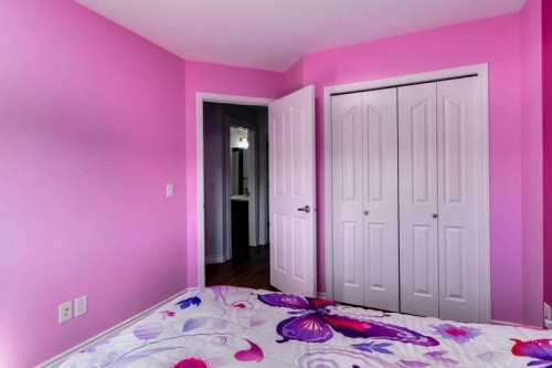 128 Juniper Street, Fort Mcmurray, AB - Indoor Photo Showing Bedroom