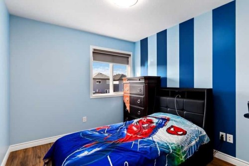 128 Juniper Street, Fort Mcmurray, AB - Indoor Photo Showing Bedroom