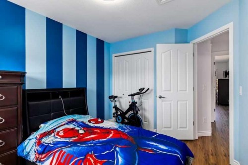 128 Juniper Street, Fort Mcmurray, AB - Indoor Photo Showing Bedroom