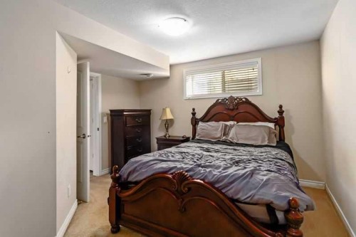 128 Juniper Street, Fort Mcmurray, AB - Indoor Photo Showing Bedroom
