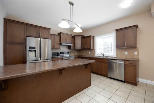 236 Falcon Drive, Fort Mcmurray, AB - Indoor Photo Showing Kitchen With Stainless Steel Kitchen With Double Sink