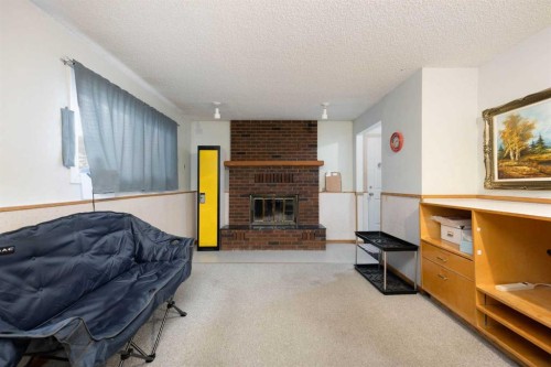 206 Leigh Crescent, Fort Mcmurray, AB - Indoor Photo Showing Other Room With Fireplace