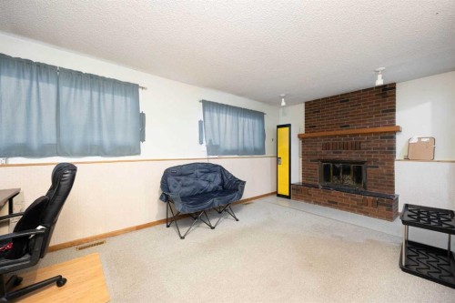 206 Leigh Crescent, Fort Mcmurray, AB - Indoor With Fireplace