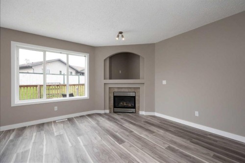 164 Cinnamon Street, Fort Mcmurray, AB - Indoor Photo Showing Living Room With Fireplace