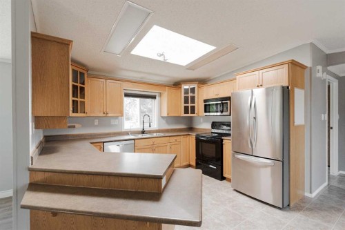 150 Hopegood Drive, Anzac, AB - Indoor Photo Showing Kitchen