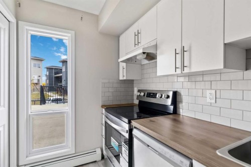 712-201 Abasand Drive, Fort Mcmurray, AB - Indoor Photo Showing Kitchen With Stainless Steel Kitchen With Upgraded Kitchen