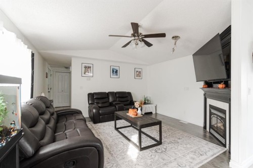 152 Harpe Way, Fort Mcmurray, AB - Indoor Photo Showing Living Room With Fireplace