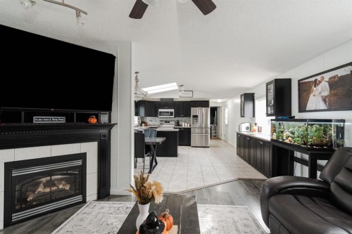 152 Harpe Way, Fort Mcmurray, AB - Indoor Photo Showing Living Room With Fireplace