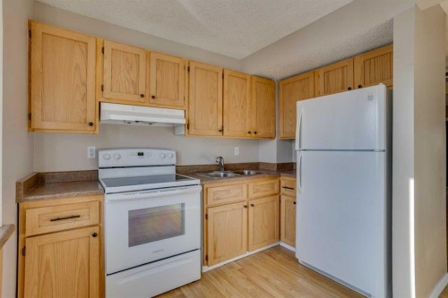 153C Dickins Drive, Fort Mcmurray, AB - Indoor Photo Showing Kitchen With Double Sink