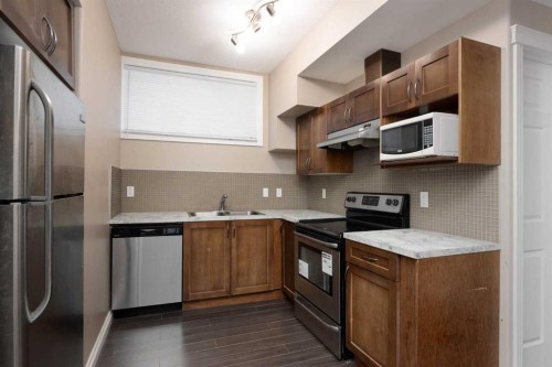 149 Pintail Place, Fort Mcmurray, AB - Indoor Photo Showing Kitchen With Double Sink With Upgraded Kitchen