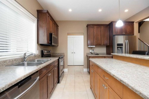 197 Snowy Owl Way Nw, Fort Mcmurray, AB - Indoor Photo Showing Kitchen With Double Sink