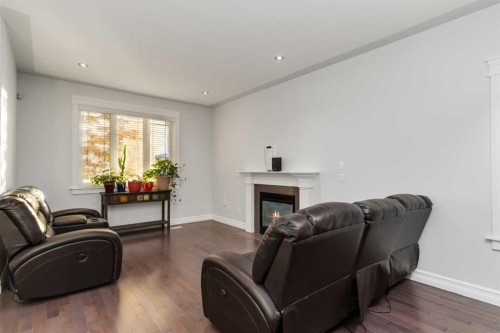 104 Collicott Drive, Fort Mcmurray, AB - Indoor Photo Showing Living Room With Fireplace