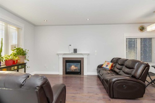 104 Collicott Drive, Fort Mcmurray, AB - Indoor Photo Showing Living Room With Fireplace