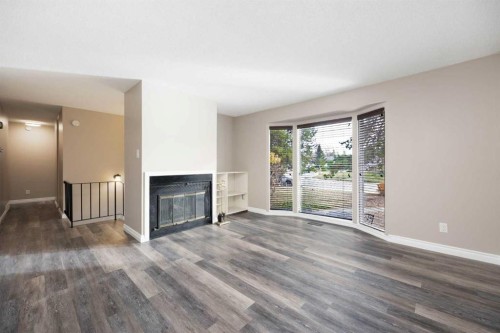 20 Clark Crescent, Fort Mcmurray, AB - Indoor Photo Showing Living Room With Fireplace