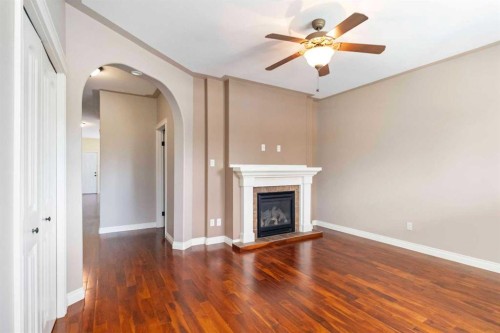 177 Sparrow Hawk Drive, Fort Mcmurray, AB - Indoor Photo Showing Living Room With Fireplace
