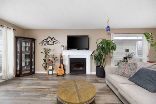 157 Archibald Close, Fort Mcmurray, AB - Indoor Photo Showing Living Room With Fireplace