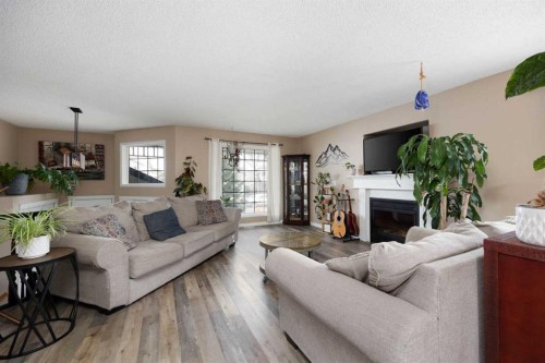157 Archibald Close, Fort Mcmurray, AB - Indoor Photo Showing Living Room With Fireplace