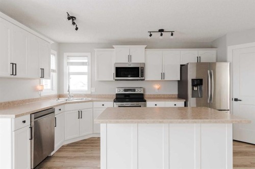 217 Archibald Close, Fort Mcmurray, AB - Indoor Photo Showing Kitchen With Stainless Steel Kitchen