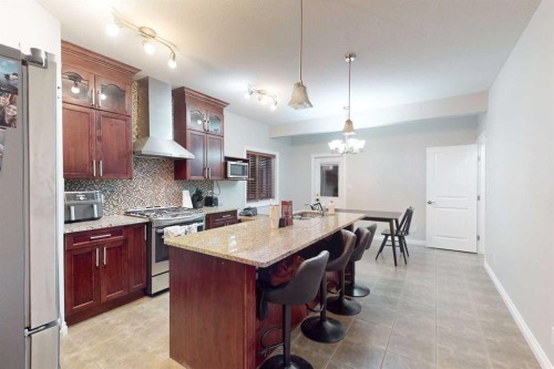 161 Coniker Crescent, Fort Mcmurray, AB - Indoor Photo Showing Kitchen With Upgraded Kitchen