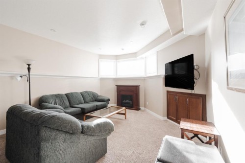 161 Chestnut Way, Fort Mcmurray, AB - Indoor Photo Showing Other Room With Fireplace