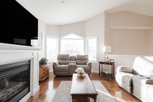 161 Chestnut Way, Fort Mcmurray, AB - Indoor Photo Showing Living Room With Fireplace