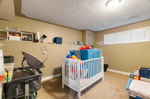 176 Bacon Place, Fort Mcmurray, AB - Indoor Photo Showing Bedroom