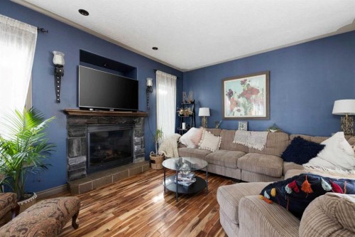 138 Mink Lane, Fort Mcmurray, AB - Indoor Photo Showing Living Room With Fireplace