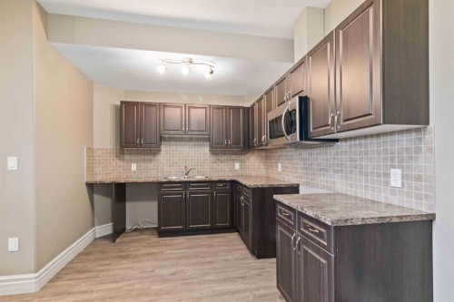 131 Falcon Green, Fort Mcmurray, AB - Indoor Photo Showing Kitchen With Upgraded Kitchen