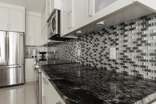 216 Comeau Crescent, Fort Mcmurray, AB - Indoor Photo Showing Kitchen With Upgraded Kitchen