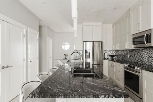 216 Comeau Crescent, Fort Mcmurray, AB - Indoor Photo Showing Kitchen With Double Sink With Upgraded Kitchen