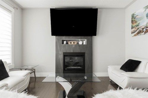 216 Comeau Crescent, Fort Mcmurray, AB - Indoor Photo Showing Living Room With Fireplace