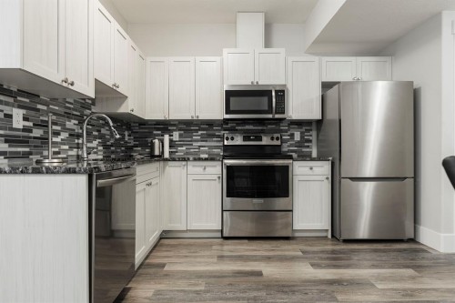 216 Comeau Crescent, Fort Mcmurray, AB - Indoor Photo Showing Kitchen With Upgraded Kitchen