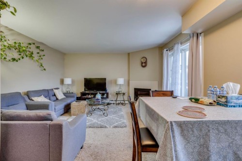 134-201 Abasand Drive, Fort Mcmurray, AB - Indoor Photo Showing Living Room With Fireplace