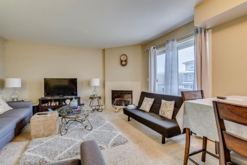 134-201 Abasand Drive, Fort Mcmurray, AB - Indoor Photo Showing Living Room With Fireplace