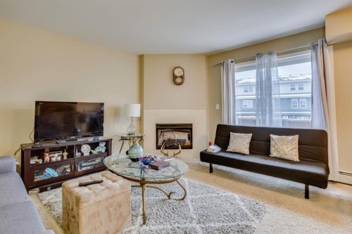 134-201 Abasand Drive, Fort Mcmurray, AB - Indoor Photo Showing Living Room With Fireplace