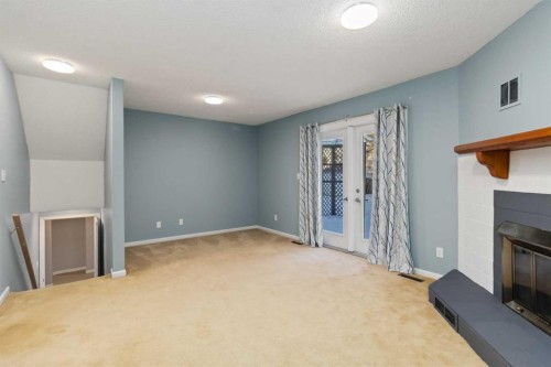 140 Brosseau Crescent, Fort Mcmurray, AB - Indoor Photo Showing Other Room With Fireplace