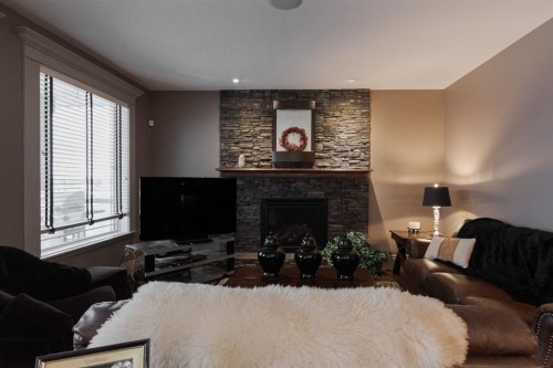 472 Killdeer Way, Fort Mcmurray, AB - Indoor Photo Showing Living Room With Fireplace
