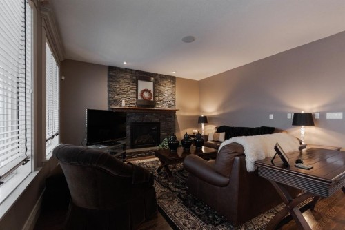 472 Killdeer Way, Fort Mcmurray, AB - Indoor Photo Showing Living Room With Fireplace
