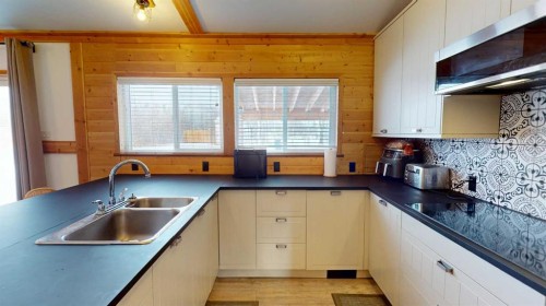 163033 Twp Rd 714, Wandering River, AB - Indoor Photo Showing Kitchen With Double Sink