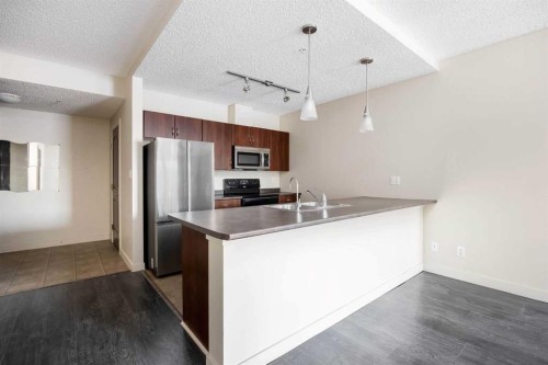 214-136C Sandpiper Road, Fort Mcmurray, AB - Indoor Photo Showing Kitchen With Double Sink