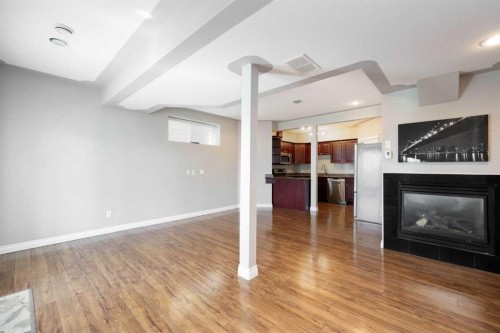 121 Gravelstone Way, Fort Mcmurray, AB - Indoor Photo Showing Living Room With Fireplace
