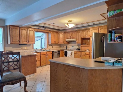 79 Lakeview Crescent, Lac La Biche, AB - Indoor Photo Showing Kitchen With Double Sink