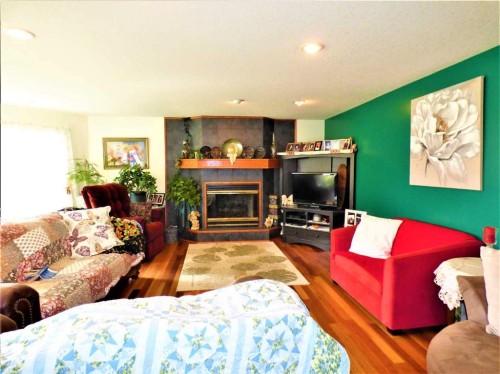 13164 Lakeland Drive, Lac La Biche, AB - Indoor Photo Showing Living Room With Fireplace