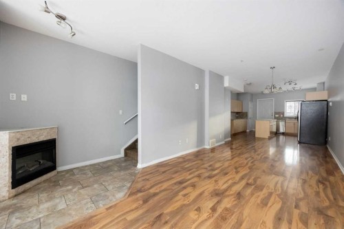 5107-200 Lougheed Drive, Fort Mcmurray, AB - Indoor Photo Showing Other Room With Fireplace