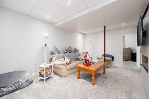 314 Pacific Crescent, Fort Mcmurray, AB - Indoor Photo Showing Other Room With Fireplace